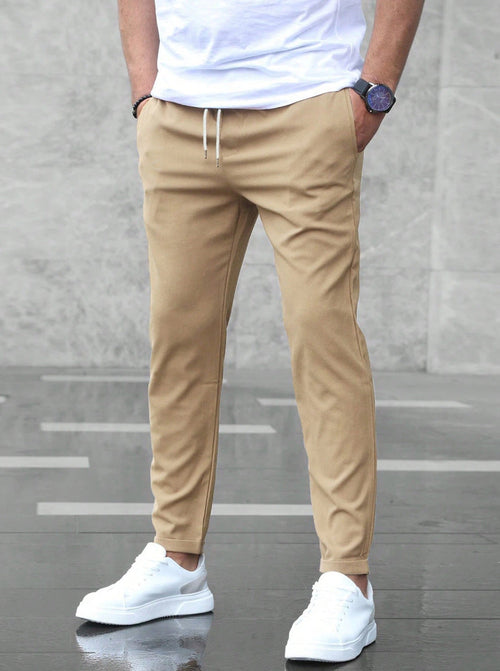 Pantalones casuales ajustados para hombre con cordón y bolsillos