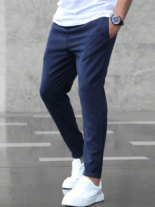 Pantalones casuales ajustados para hombre con cordón y bolsillos