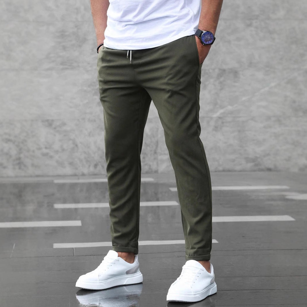 Pantalones casuales ajustados para hombre con cordón y bolsillos