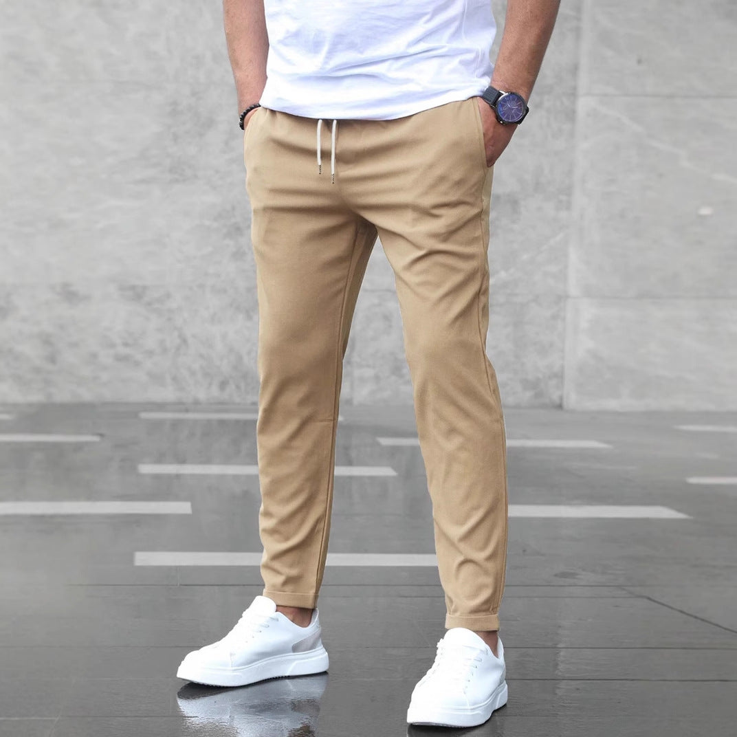 Pantalones casuales ajustados para hombre con cordón y bolsillos