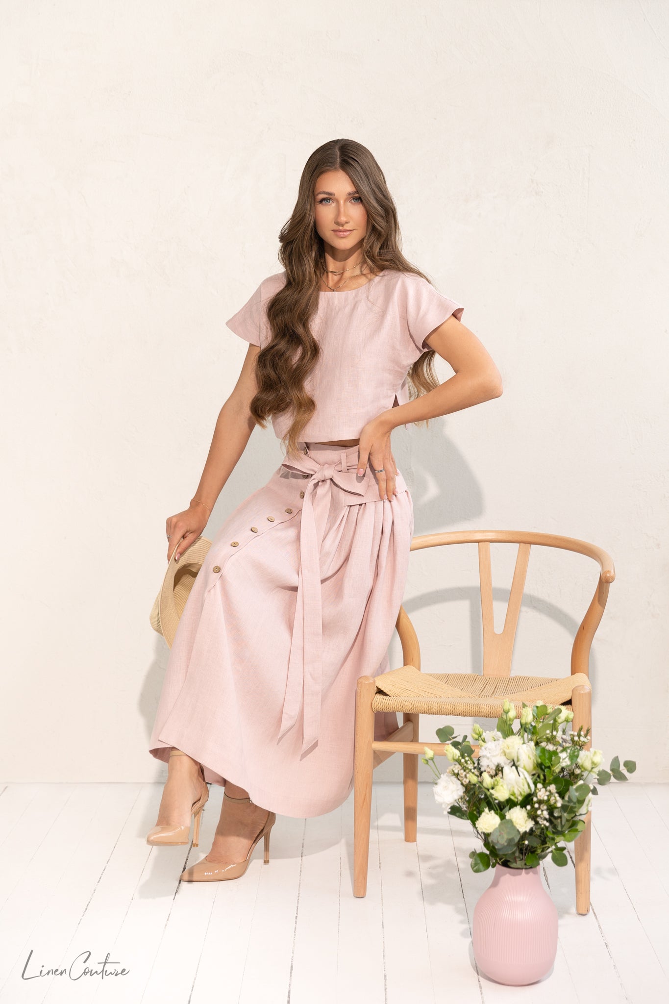 Conjunto de top corto y falda midi de lino rosa pálido Taormina
